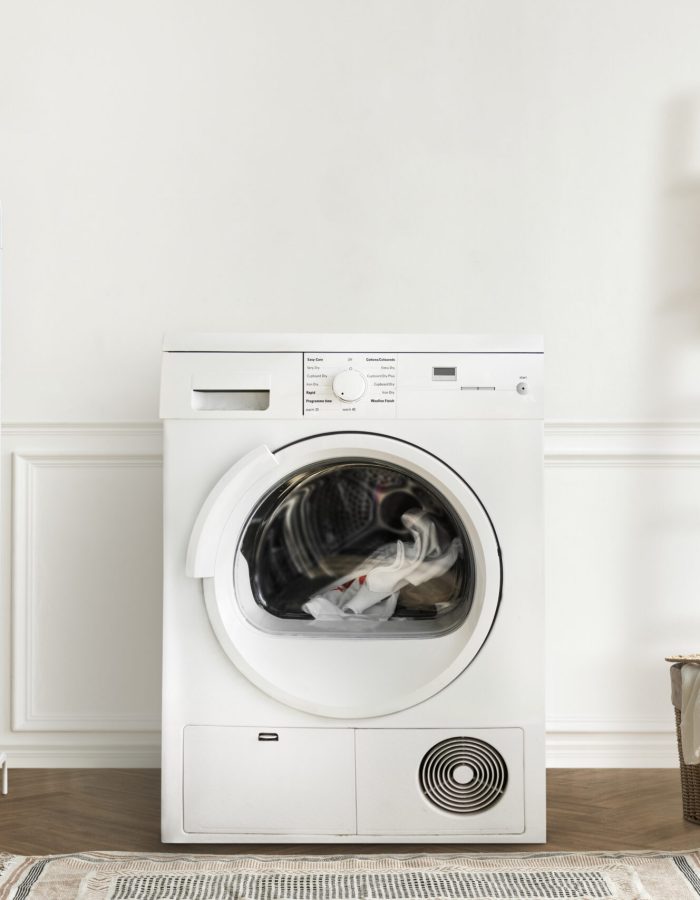 Washing machine in a minimal laundry room interior design